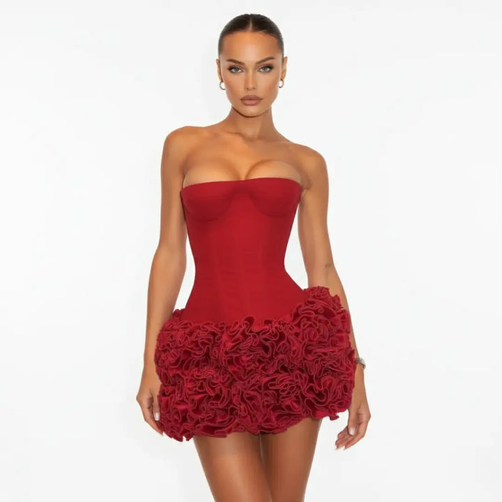 Red strapless dress with floral details on a white background