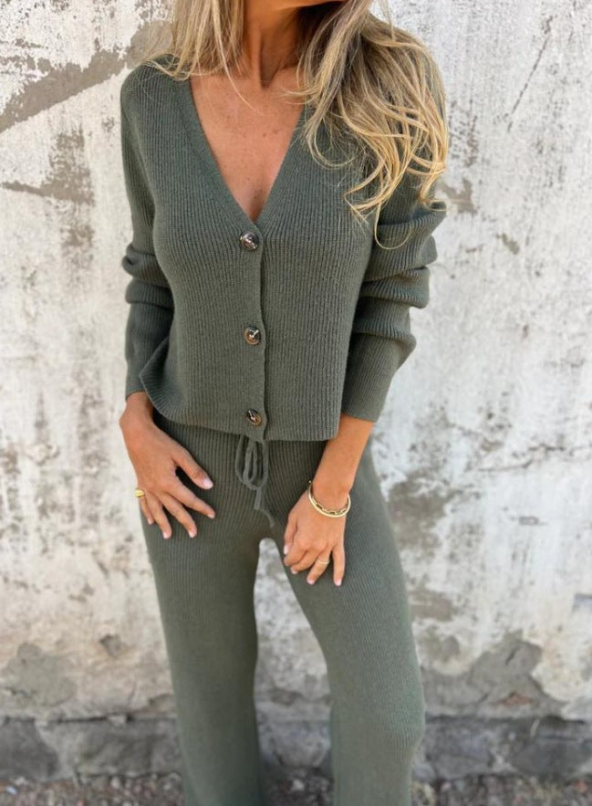 Women's knit suit with deep V-neck and elegant button details WW 7